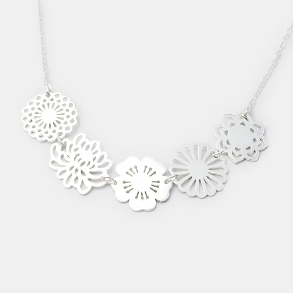 Silver necklace with a bouquet of flowers