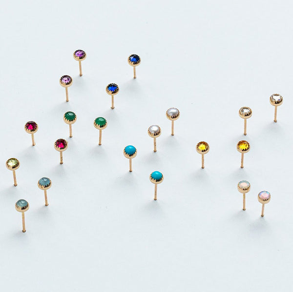 Gold stud earrings Australia with gemstones