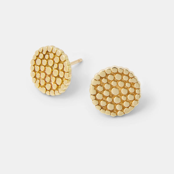 Solid gold stud earrings with a wattle flower design